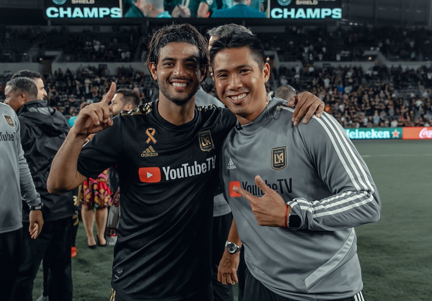 Jason Han getting his picture with Carlos Vela after a Los Angeles Football Club Soccer Match